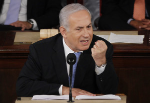 Israel's Prime Minister Benjamin Netanyahu makes a point as he addresses a joint meeting of Congress in Washington
